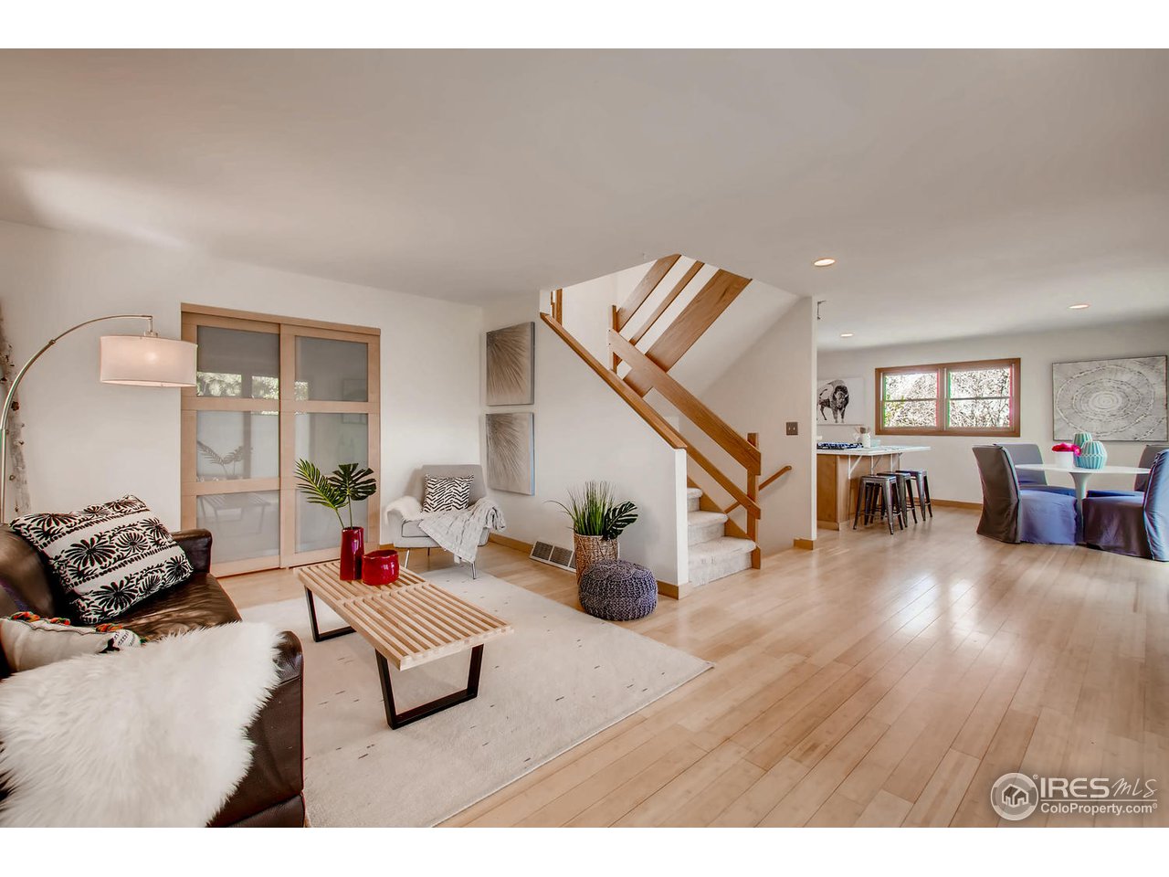 4110 Riverside Avenue Boulder, CO 80304 - Photo 10 of 39 a living room with furniture and wooden floor