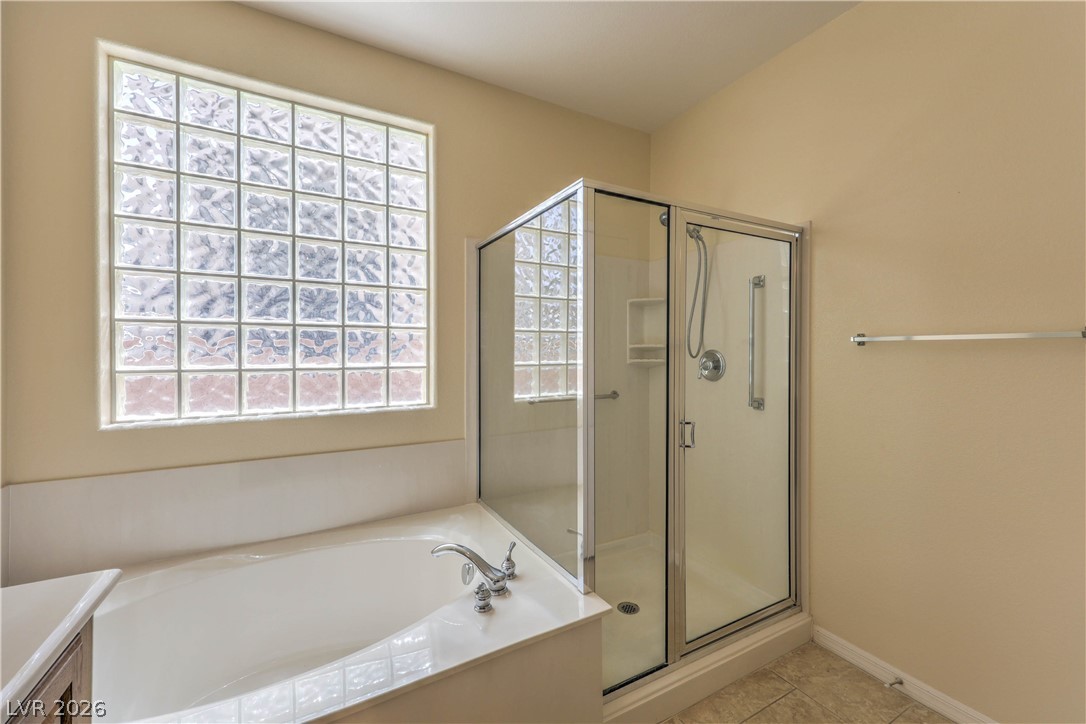 2276 Saxtons River Road Henderson, NV 89044 - Photo 20 of 49 Bathroom with Raised Vanity, Dual Sinks, Garden Tub, and Separate Shower