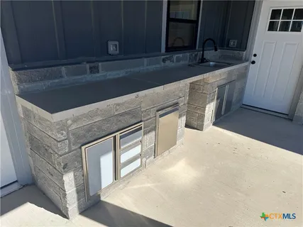 a house view with a backyard space