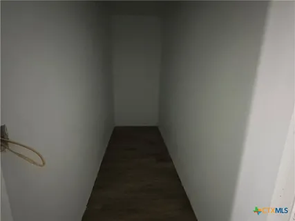 a bathroom with a tub and a shower