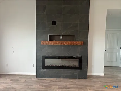 a living room with a fireplace