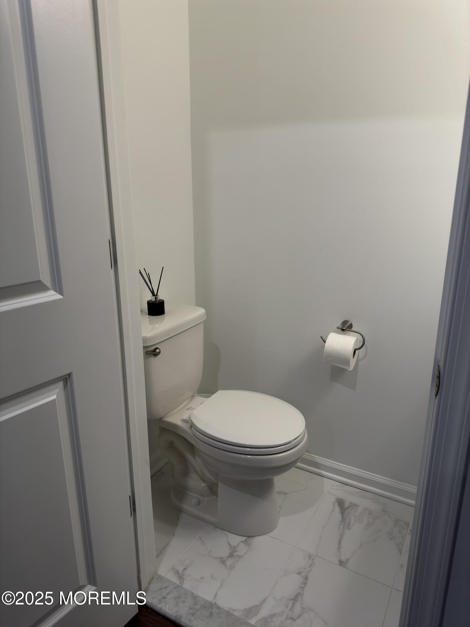 300 Prestige Road Brick, NJ 08723 - Photo 18 of 50 a white toilet sitting next to a sink