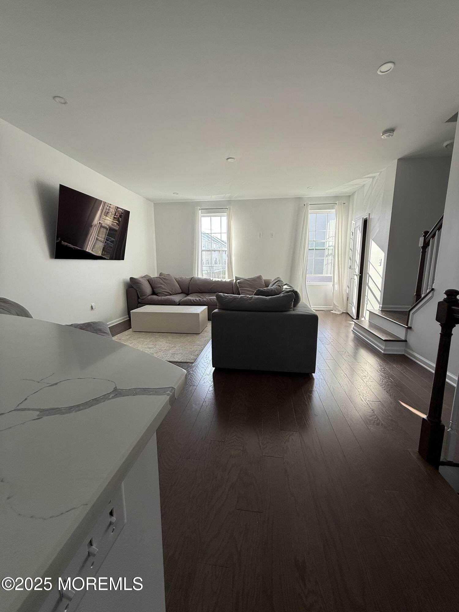 300 Prestige Road Brick, NJ 08723 - Photo 19 of 50 a living room with furniture and a flat screen tv