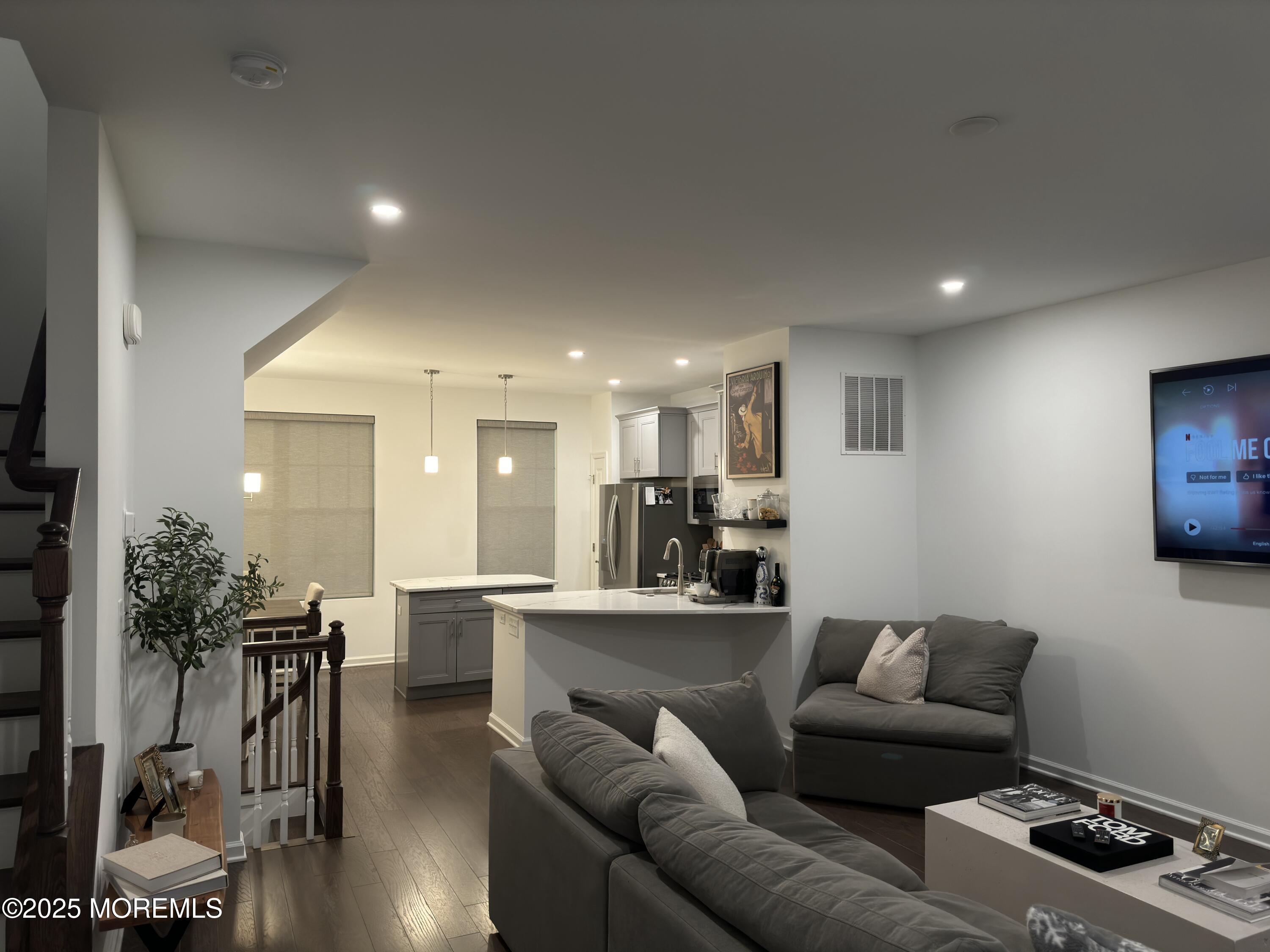 300 Prestige Road Brick, NJ 08723 - Photo 21 of 50 a living room with furniture and a wooden floor