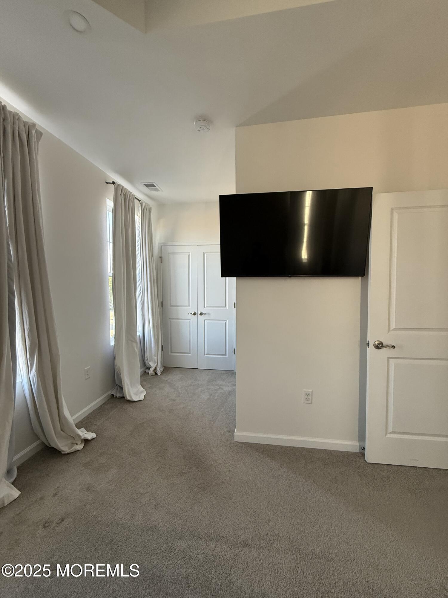 300 Prestige Road Brick, NJ 08723 - Photo 27 of 50 a view of a livingroom with a flat screen tv