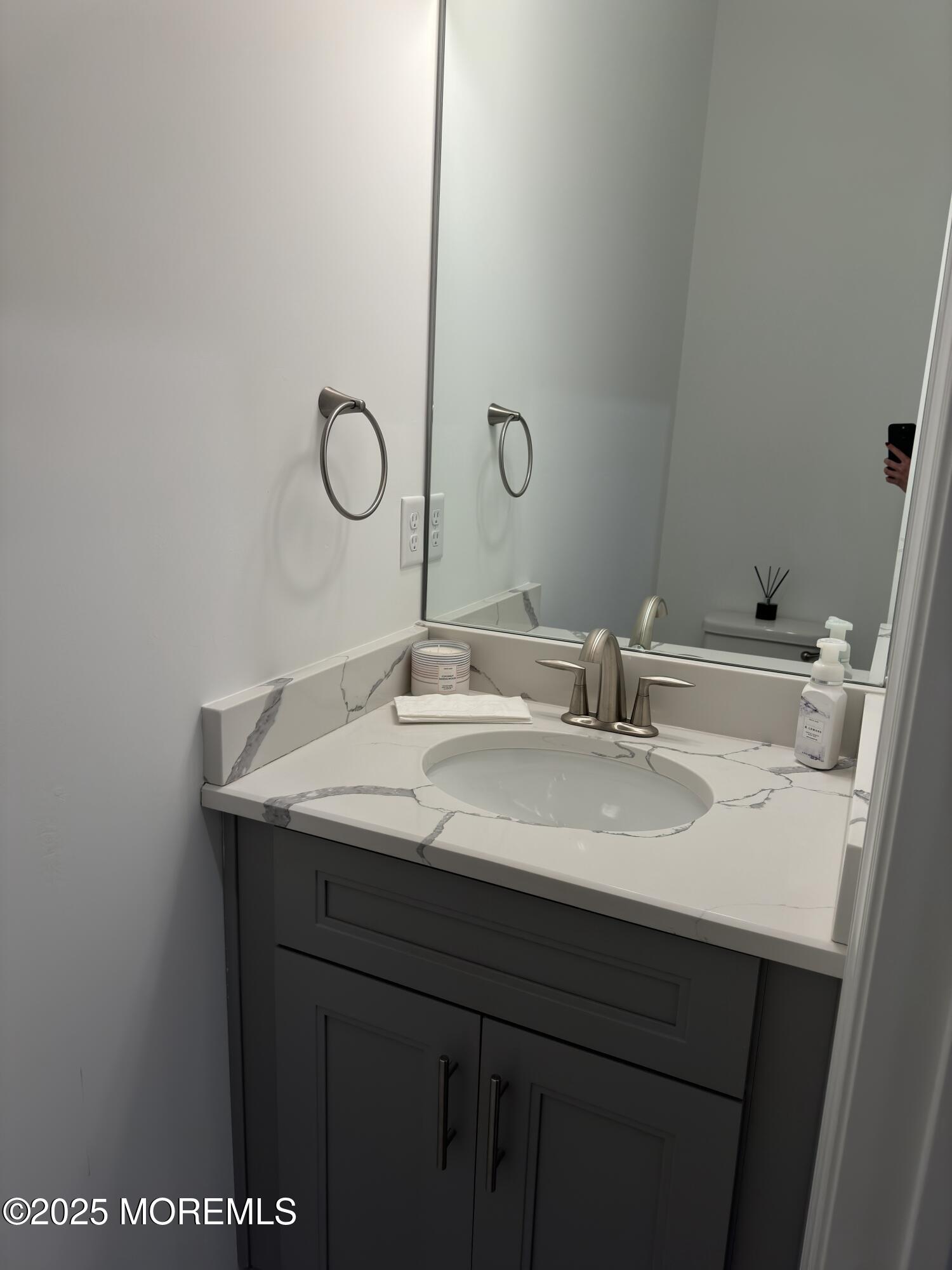 300 Prestige Road Brick, NJ 08723 - Photo 33 of 50 a bathroom with a granite countertop sink a toilet and a mirror