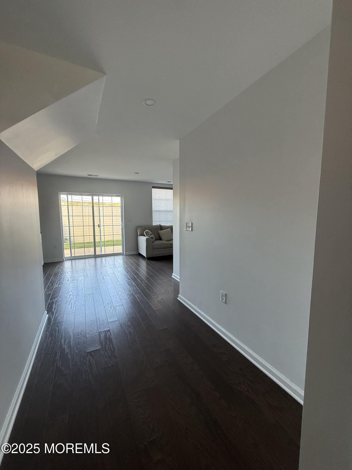 300 Prestige Road Brick, NJ 08723 - Photo 4 of 50 wooden floor in an empty room with a window