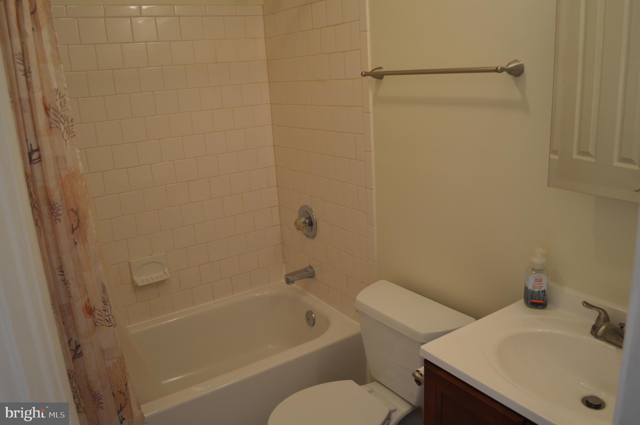 615 Nollmeyer Road Baltimore, MD 21220 - Photo 40 of 46 a bathroom with a sink toilet and bathtub