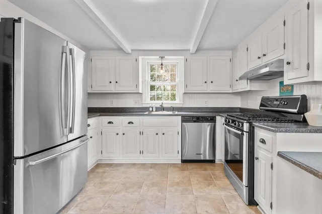 a view of balcony with furniture