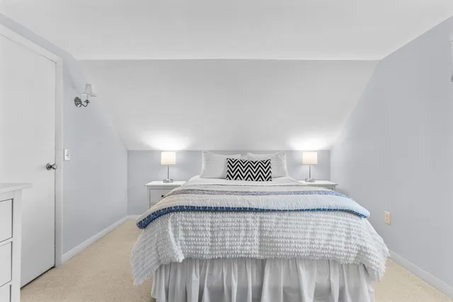 a view of a building with a table and chairs