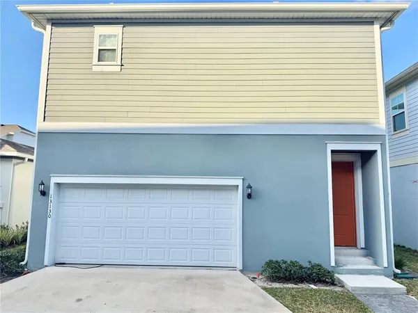 a view of a house with garage