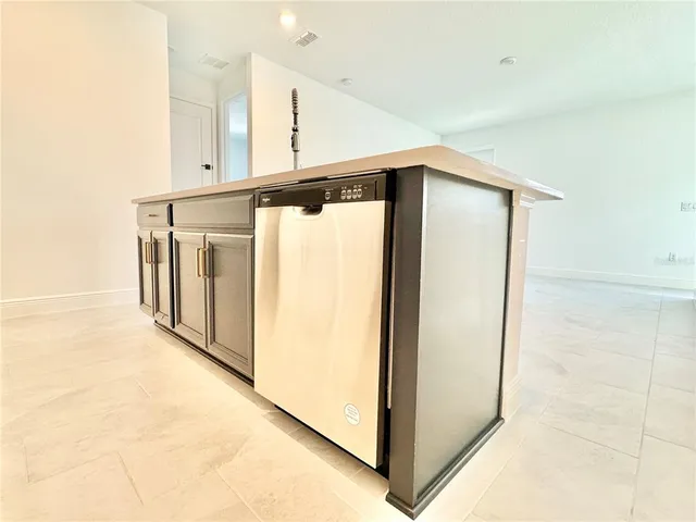 a view of hallway with washer and dryer