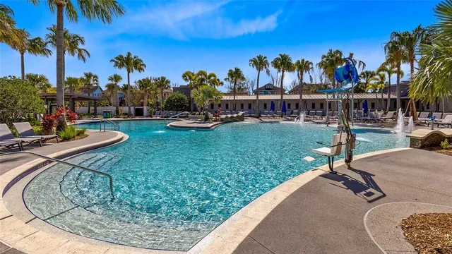 a view of a swimming pool with a patio