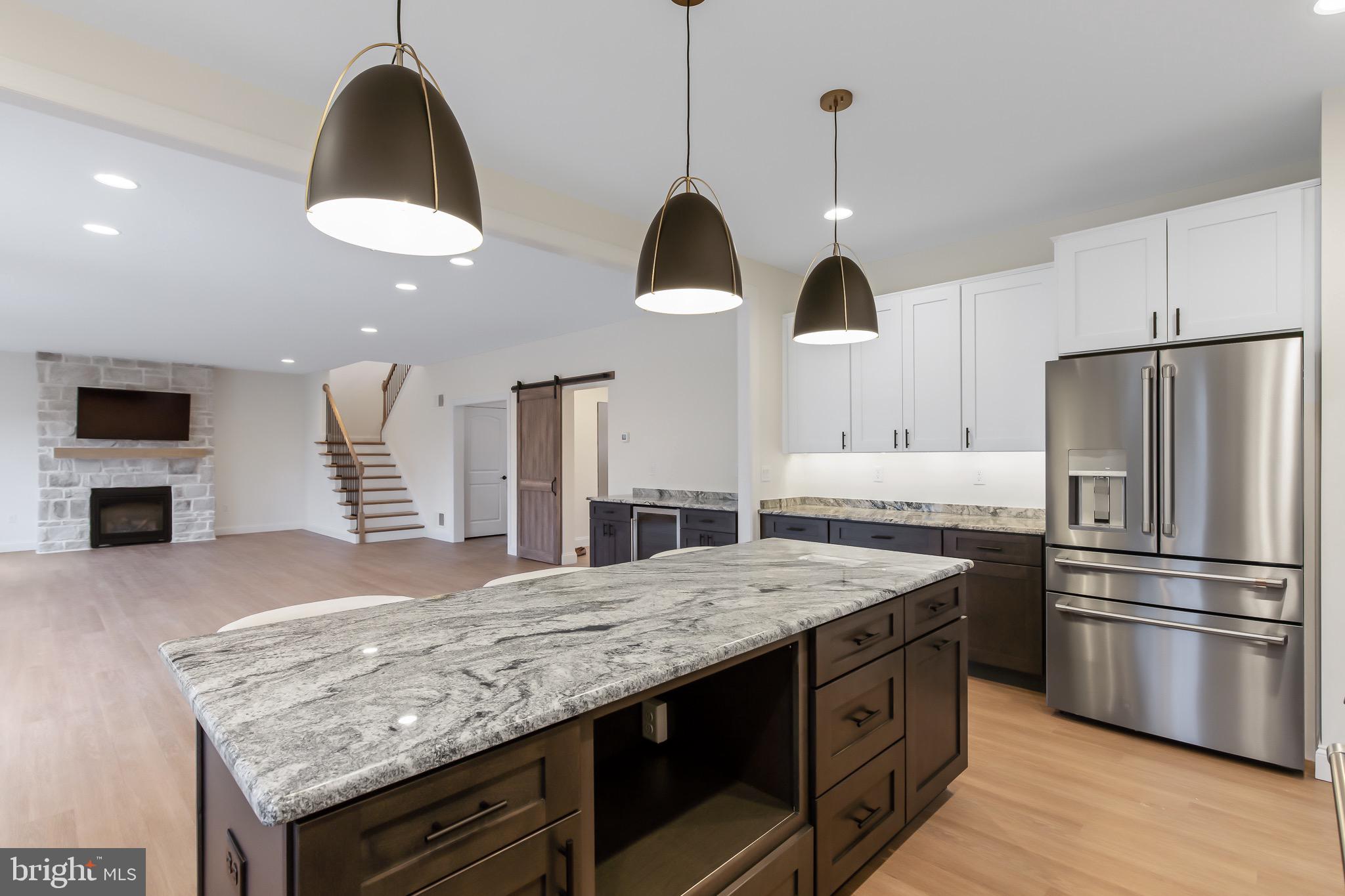 2328 Rockvale Road Lancaster, PA 17602 - Photo 21 of 55 a kitchen with stainless steel appliances granite countertop a stove a oven a refrigerator and a sink