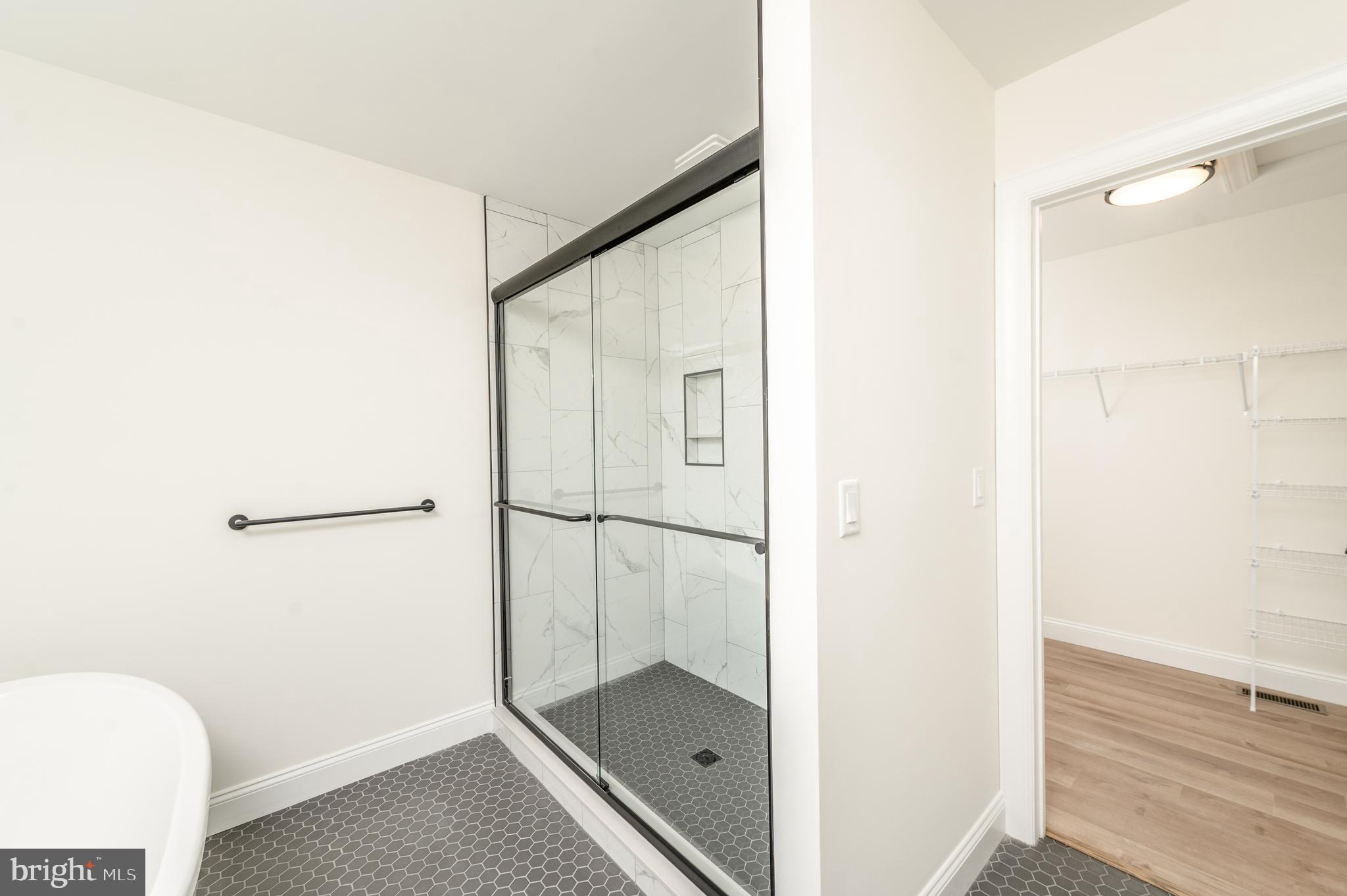 2328 Rockvale Road Lancaster, PA 17602 - Photo 32 of 55 a bathroom with a glass shower door