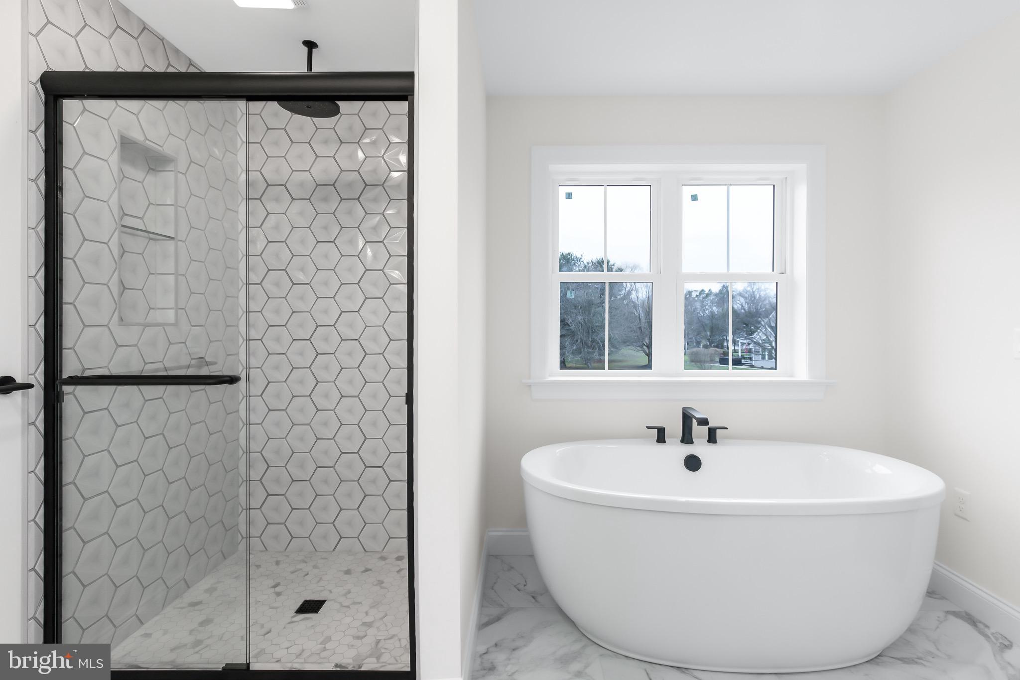 2328 Rockvale Road Lancaster, PA 17602 - Photo 35 of 55 a white bath tub sitting next to a window