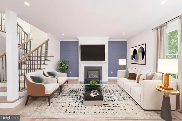 a large kitchen with kitchen island a stove a sink a center island and wooden floor