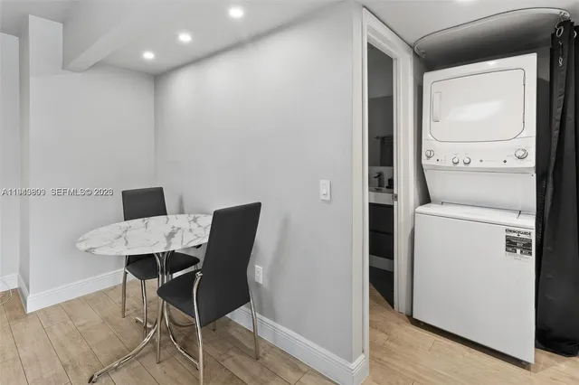 a workspace with furniture and wooden floor