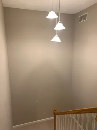 a view of a chandelier in a room