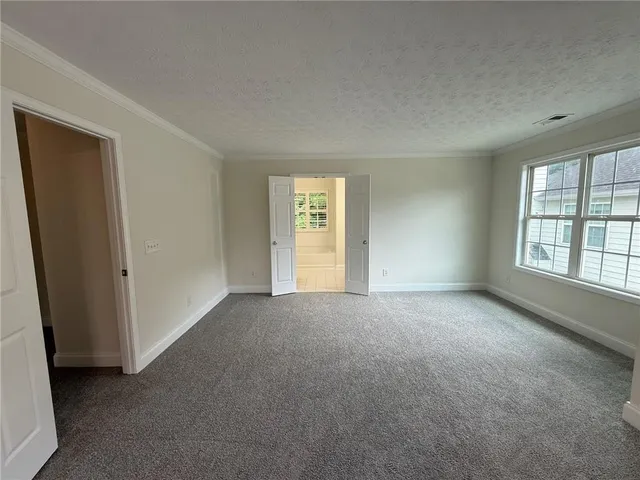 a view of a hallway with elevator