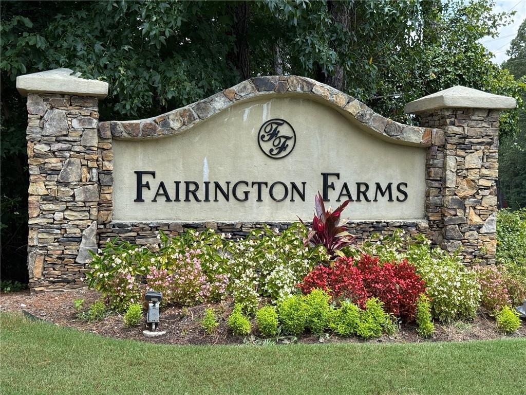 2966 Fairton Trail Lithonia, GA 30038 - Photo 28 of 28 a sign on the side of a building