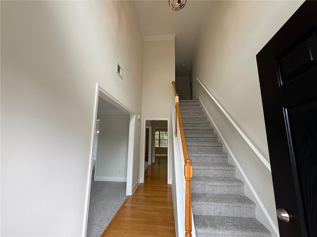 2966 Fairton Trail Lithonia, GA 30038 - Photo 4 of 28 a view of a hallway with stairs