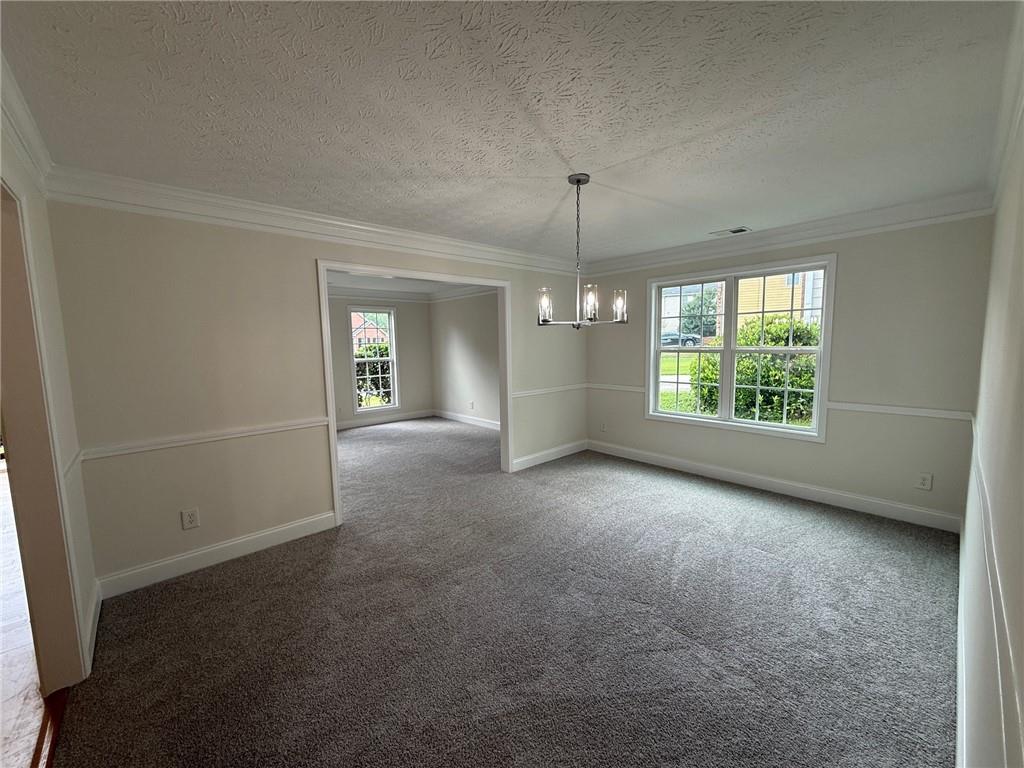 2966 Fairton Trail Lithonia, GA 30038 - Photo 10 of 28 an empty room with windows and entrance