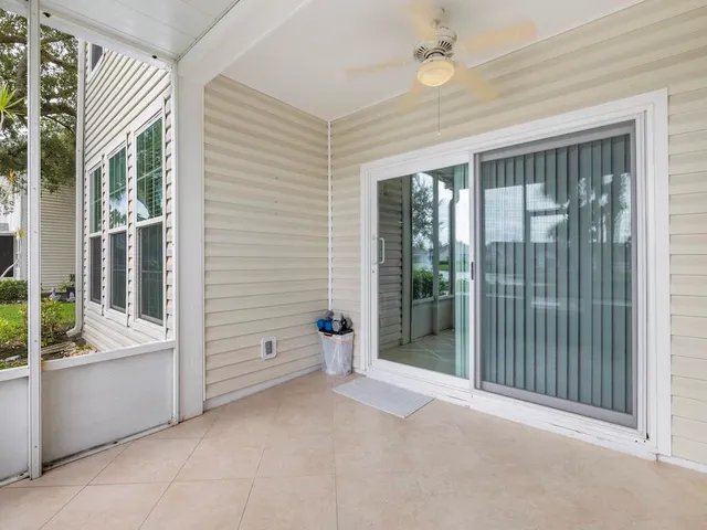 a view of an empty room with a balcony