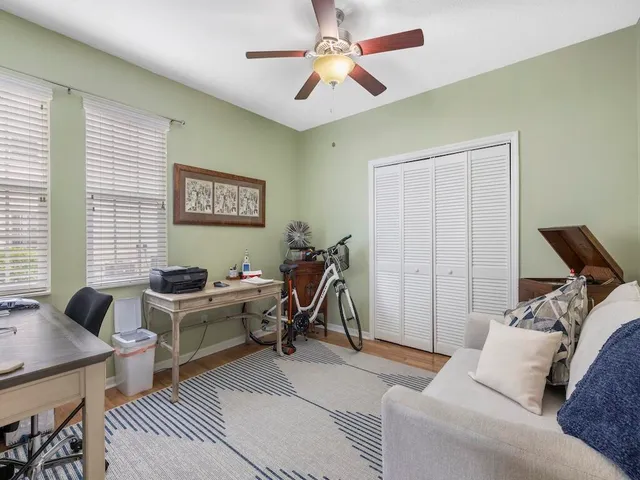 a work room with furniture and a window