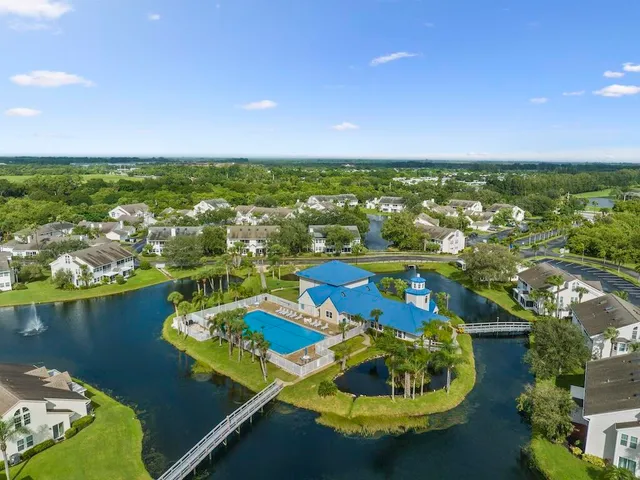 swimming pool view with lake view