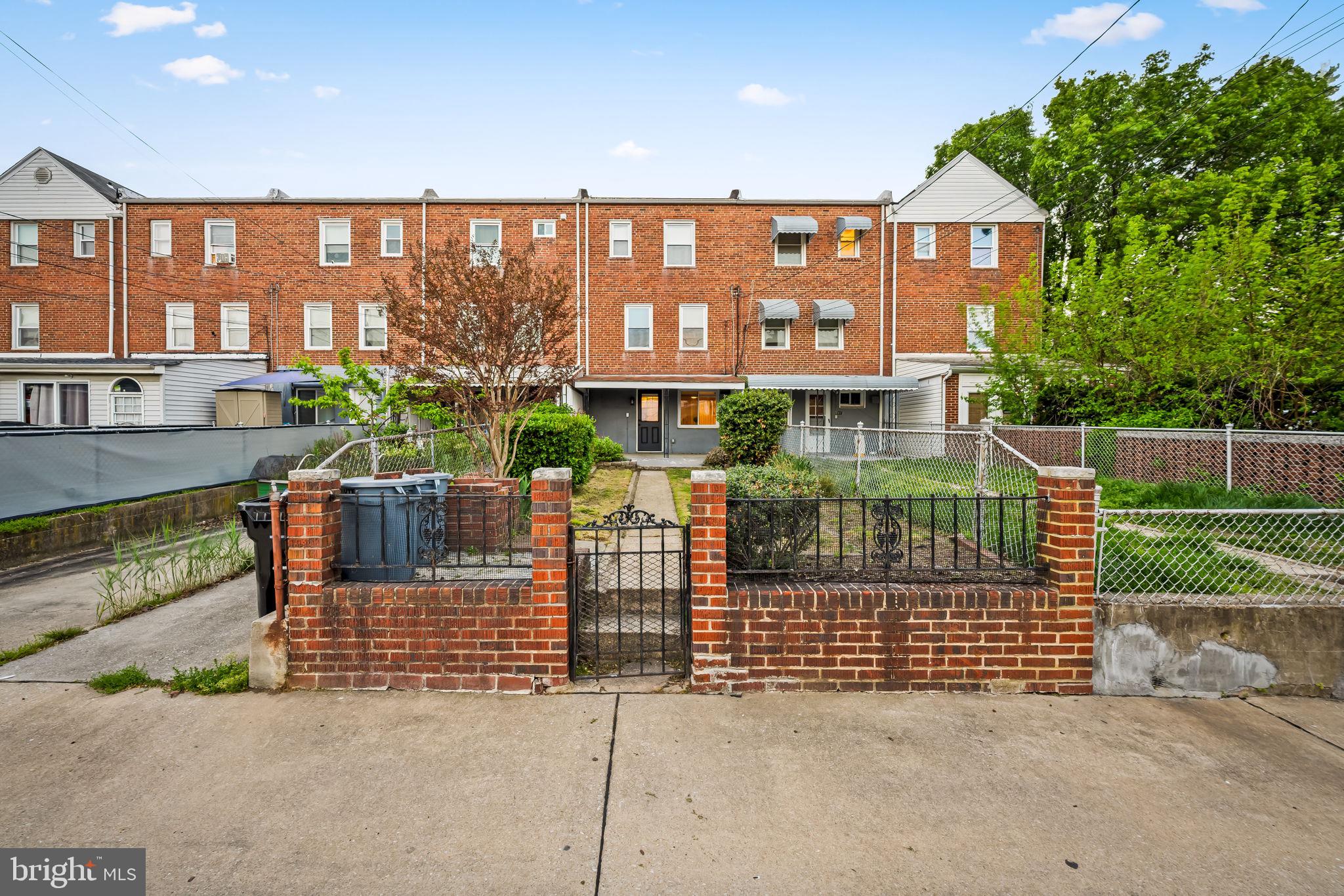 1817 Dunmere Road Baltimore, MD 21222 - Photo 27 of 27 a view of a brick house with many windows