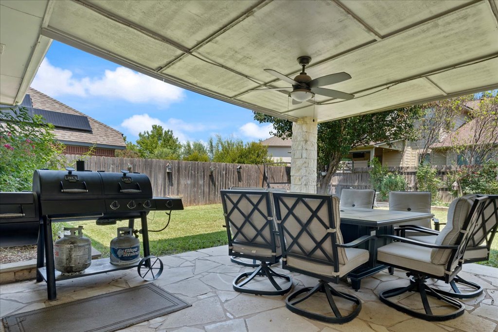 1505 Laurel Oak Loop Round Rock, TX 78665 - Photo 15 of 40 a view of a chairs and table in a patio