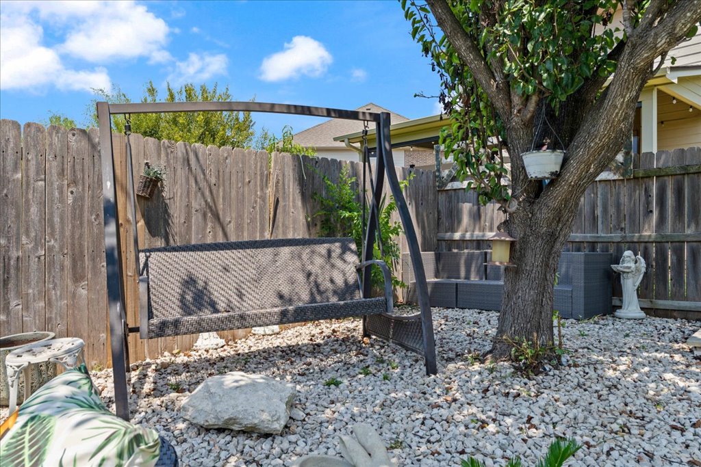 1505 Laurel Oak Loop Round Rock, TX 78665 - Photo 17 of 40 a view of a house with a wooden fence
