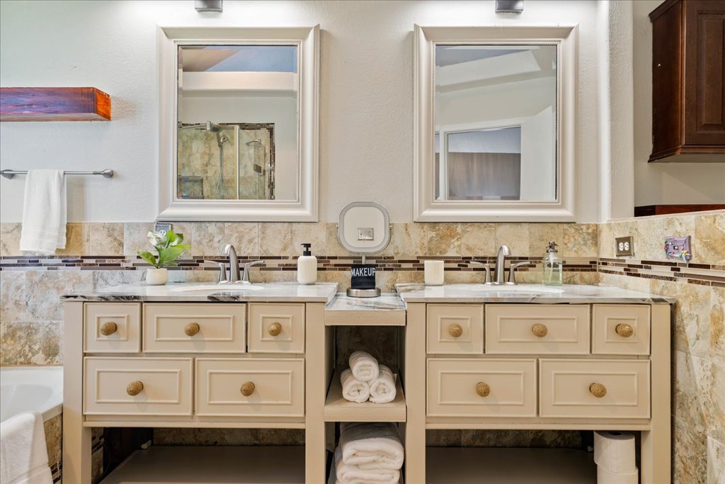 1505 Laurel Oak Loop Round Rock, TX 78665 - Photo 26 of 40 a white kitchen with a sink stove and cabinets