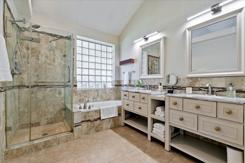 1505 Laurel Oak Loop Round Rock, TX 78665 - Photo 27 of 40 a bathroom with a double vanity sink mirror and double
