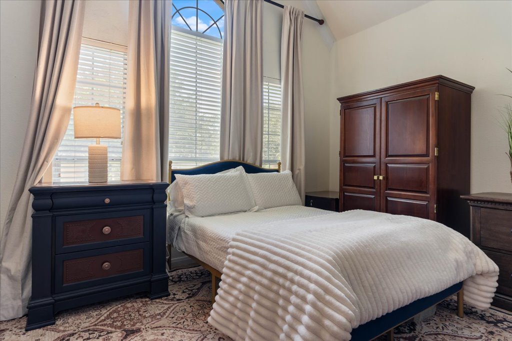 1505 Laurel Oak Loop Round Rock, TX 78665 - Photo 29 of 40 a bedroom with a bed and a dresser