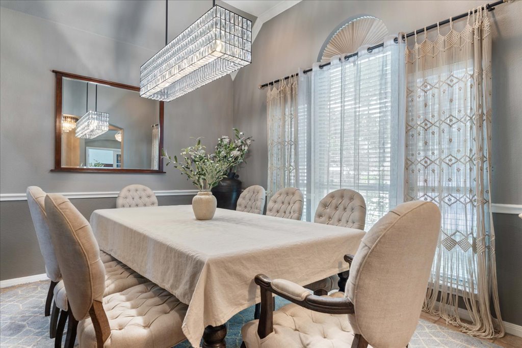 1505 Laurel Oak Loop Round Rock, TX 78665 - Photo 9 of 40 a dining room with furniture and window