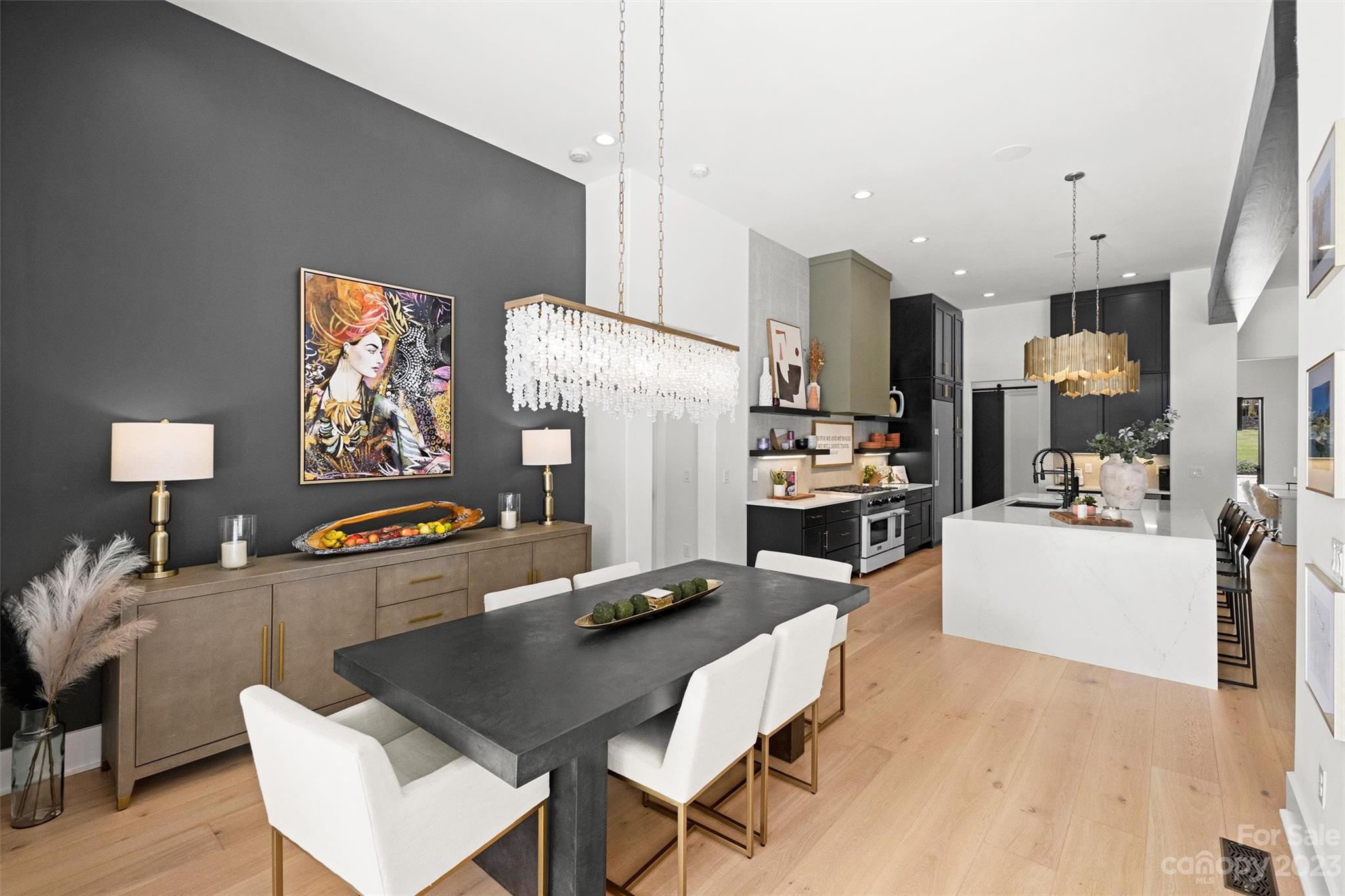 20108 Schooner Drive Cornelius, NC 28031 - Photo 15 of 46 a living room with furniture a flat screen tv and a table