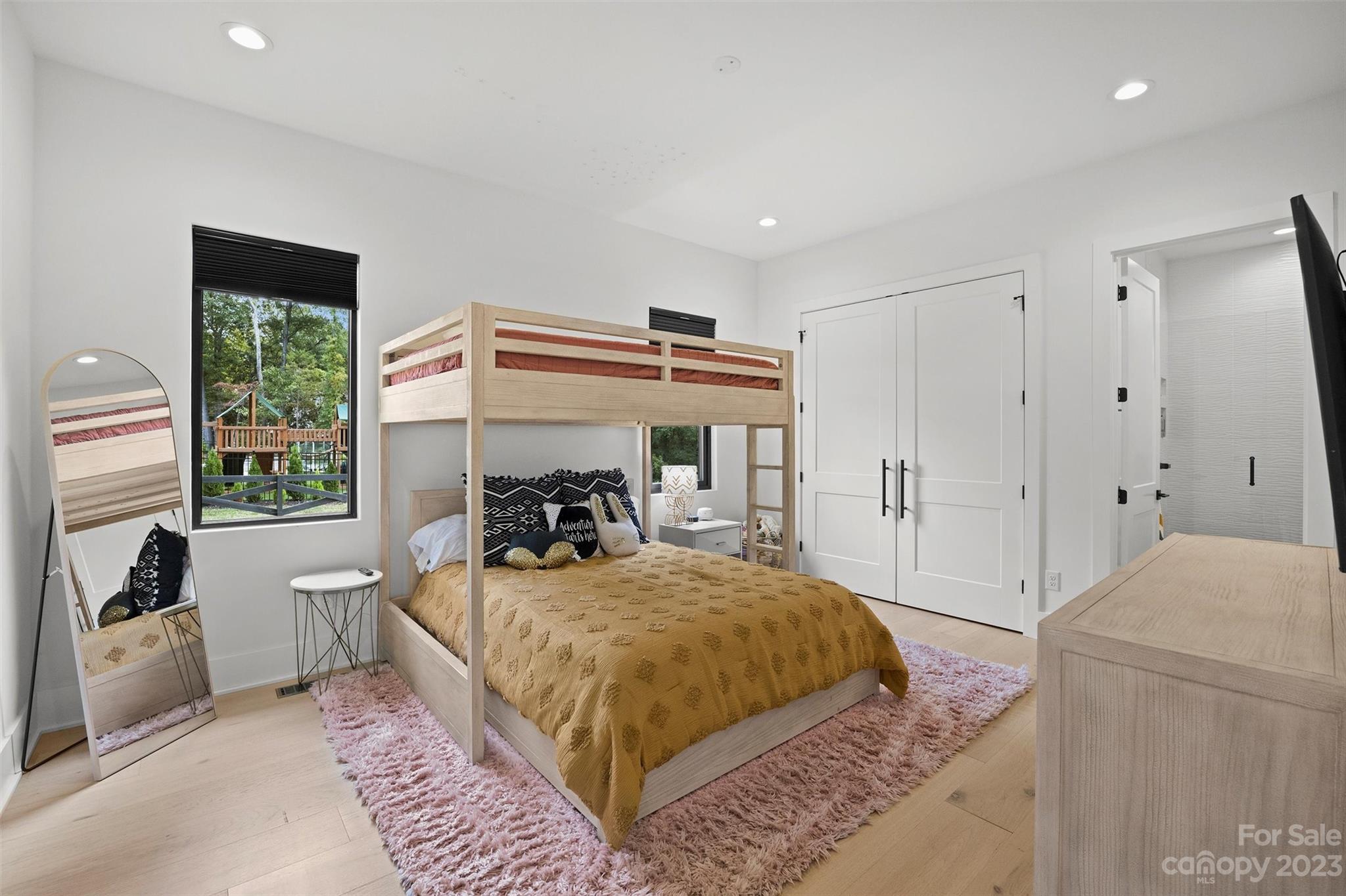 20108 Schooner Drive Cornelius, NC 28031 - Photo 22 of 46 a bedroom with a bed and a large window