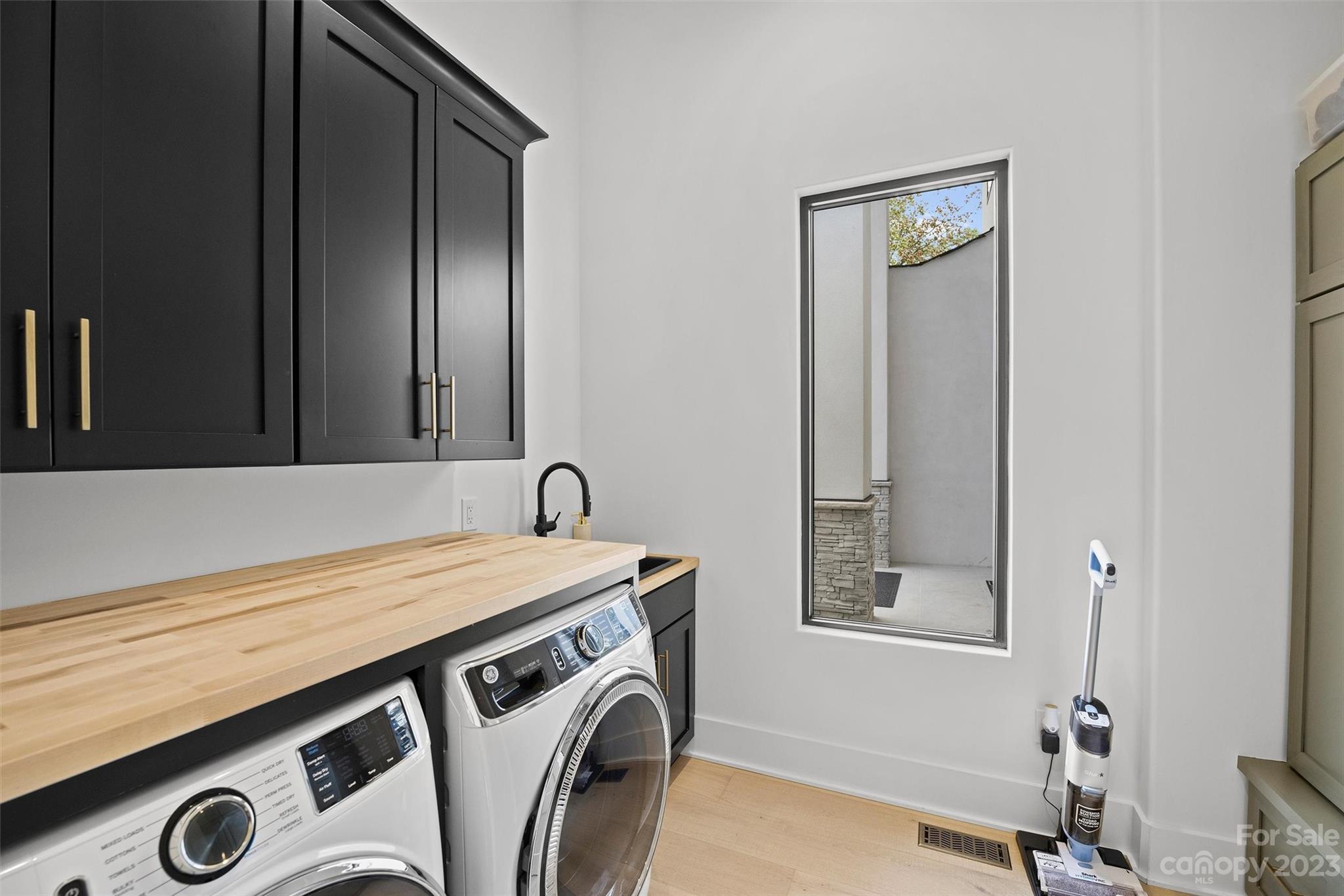 20108 Schooner Drive Cornelius, NC 28031 - Photo 26 of 46 a utility room with dryer and washer