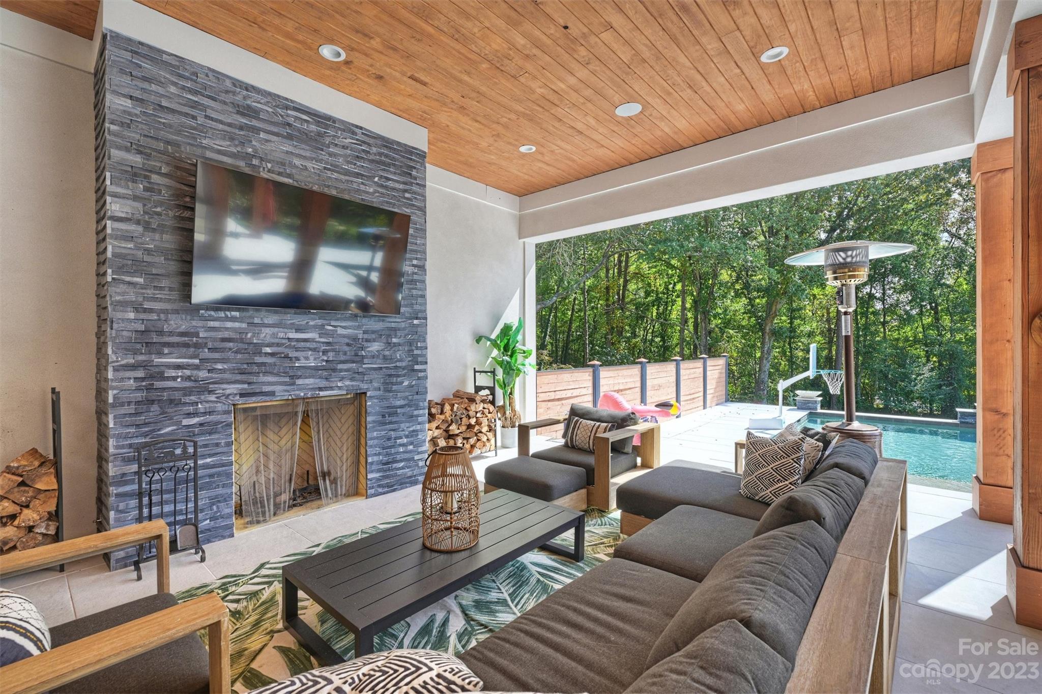 20108 Schooner Drive Cornelius, NC 28031 - Photo 35 of 46 a living room with furniture and a fireplace