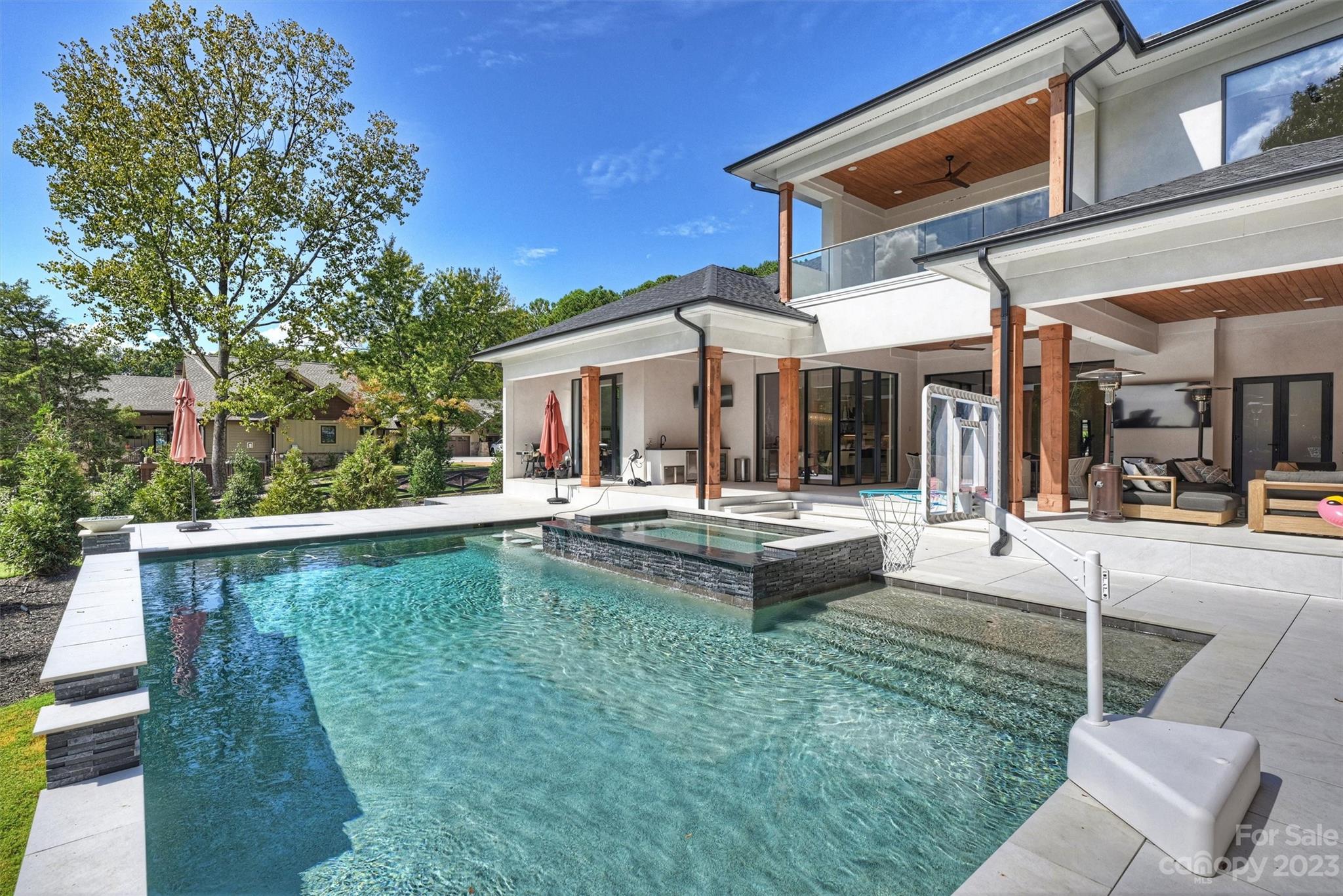 20108 Schooner Drive Cornelius, NC 28031 - Photo 40 of 46 a view of house and outdoor space with swimming pool