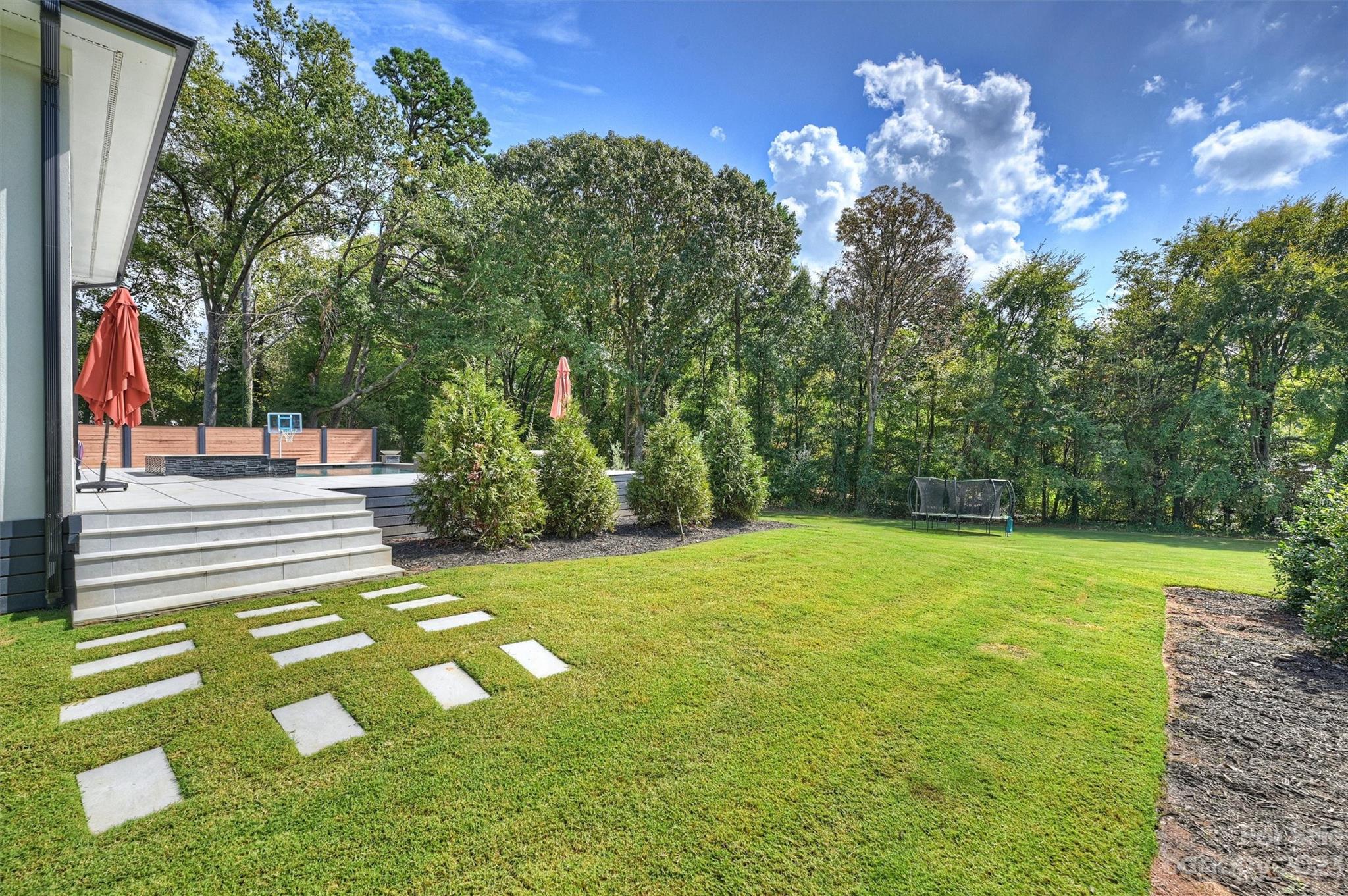 20108 Schooner Drive Cornelius, NC 28031 - Photo 41 of 46 a view of a big yard with swimming pool