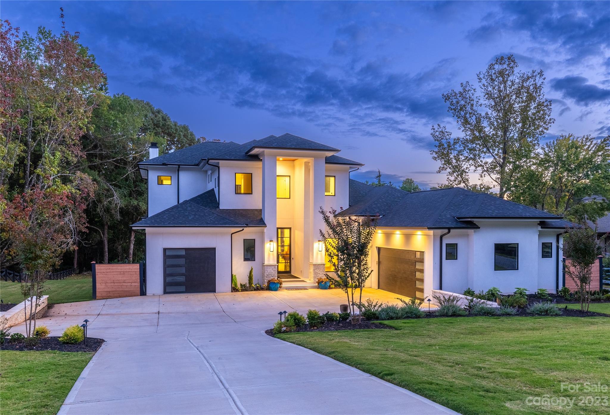 20108 Schooner Drive Cornelius, NC 28031 - Photo 44 of 46 a front view of a house with a garden
