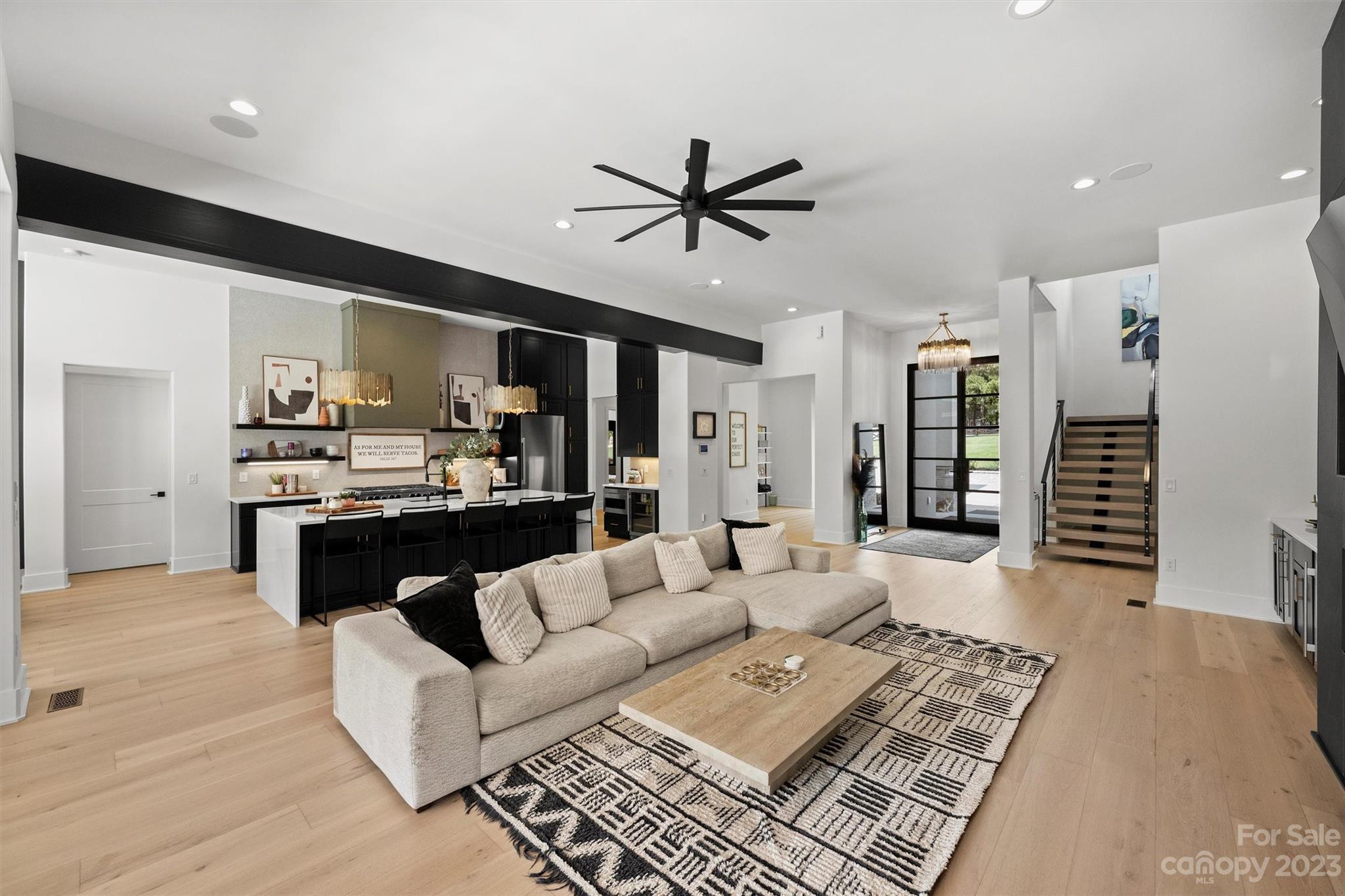 20108 Schooner Drive Cornelius, NC 28031 - Photo 9 of 46 a living room with furniture and kitchen view