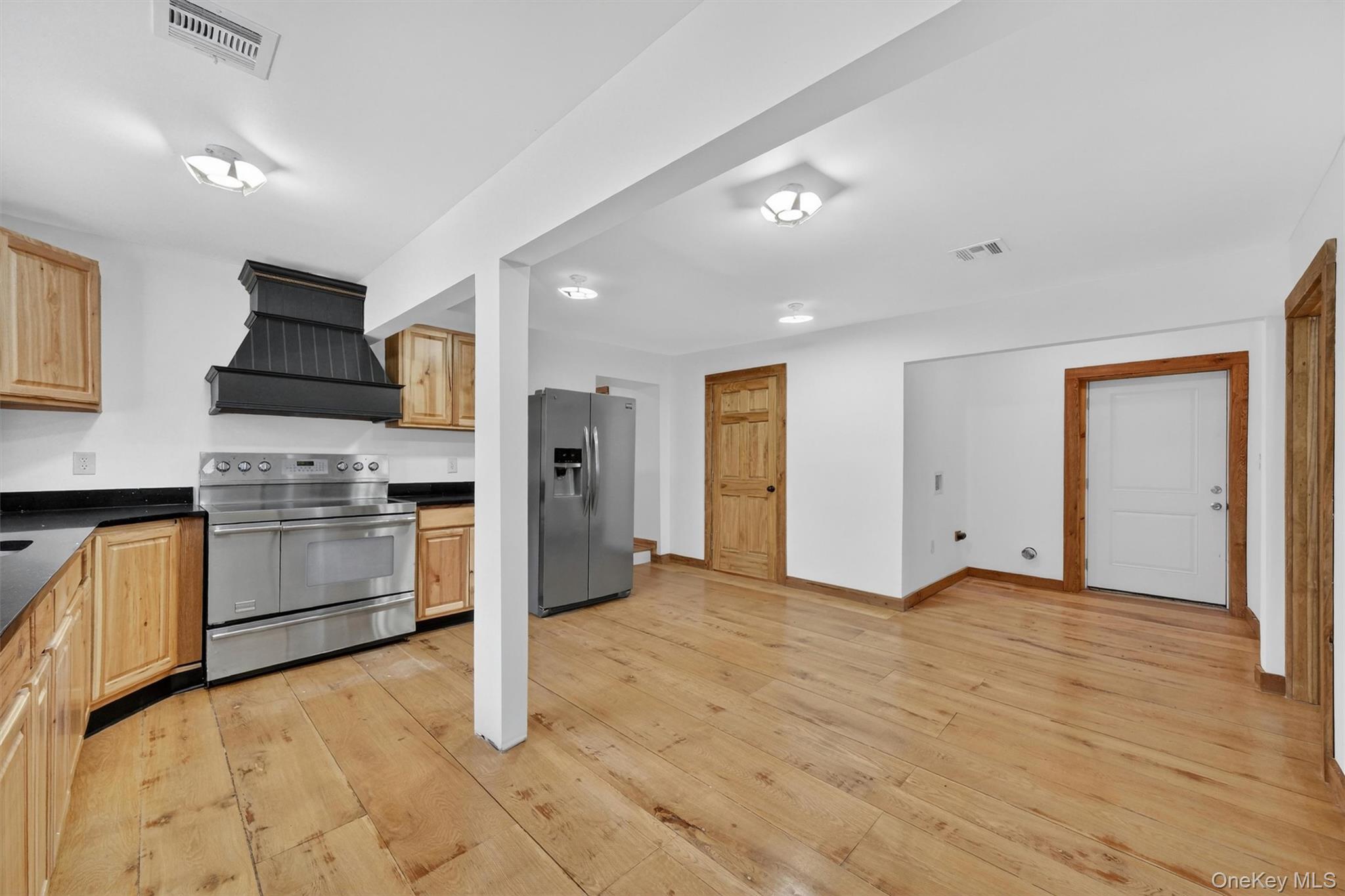 71 Blacks Road Kingston, NY 12401 - Photo 8 of 20 a view of a kitchen with a stove cabinets and a kitchen