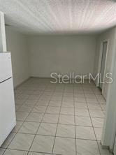 702 Michigan Court, Unit 4 St. Cloud, FL 34769 - Photo 5 of 9 a bathroom with a shower