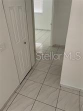 702 Michigan Court, Unit 4 St. Cloud, FL 34769 - Photo 6 of 9 a view of front door