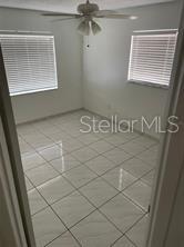 702 Michigan Court, Unit 4 St. Cloud, FL 34769 - Photo 8 of 9 a view of a room with windows