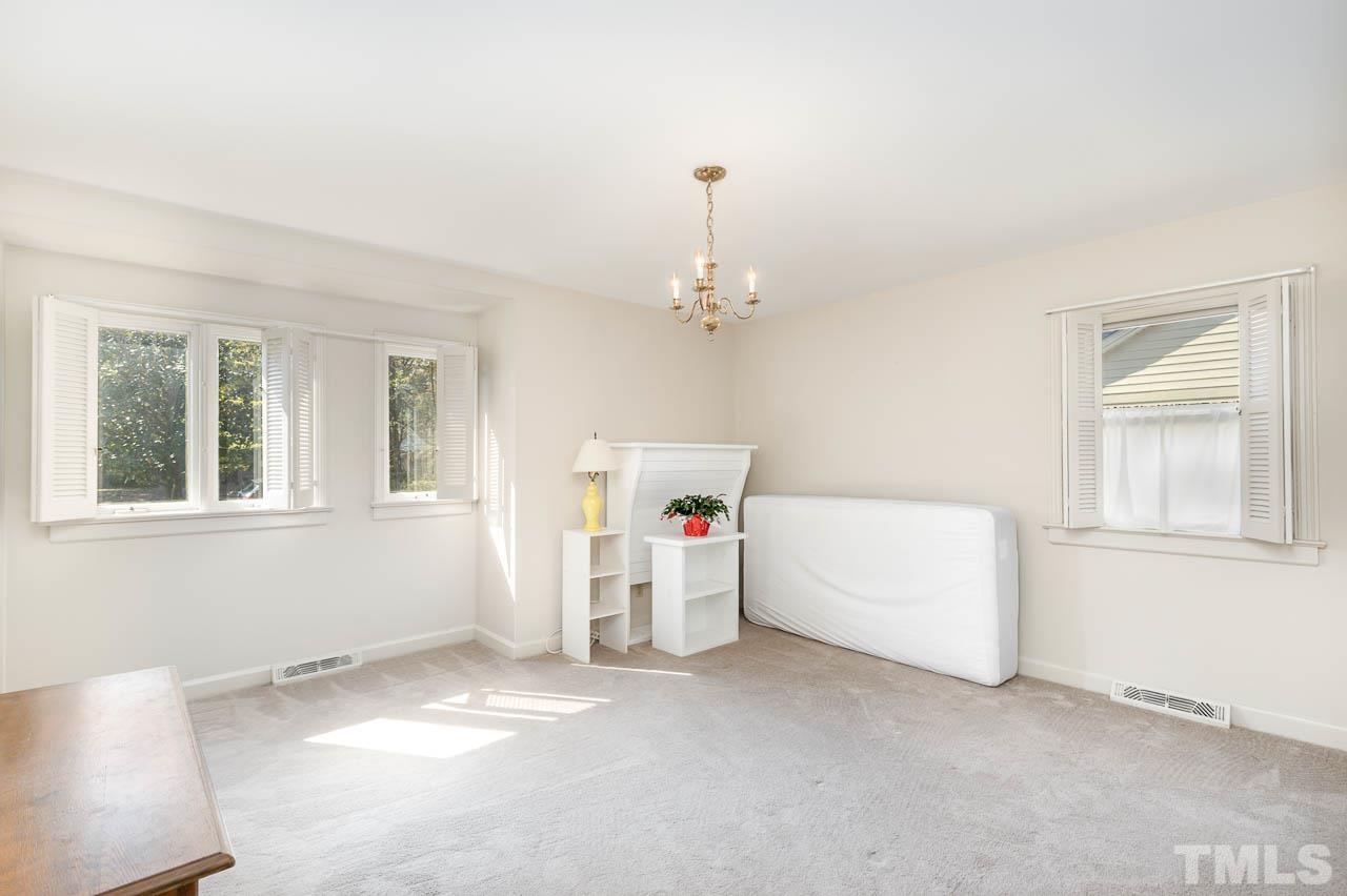 200 Ridge Road Northwest Wilson, NC 27896 - Photo 17 of 25 a view of an empty room with a window